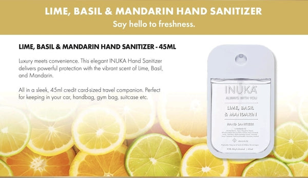 INUKA lime, basil & mandarin hand sanitizer packaging with lemon and lime slices on a yellow background